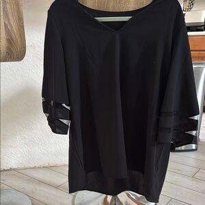 Chic Black Blouse with Sheer Sleeve Accents